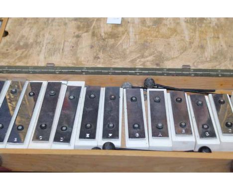 UNUSUAL CASED VINTAGE CHIME BAR SET
the 22 tuned metal bars mounted on black and white wooden resonators, with mallets
