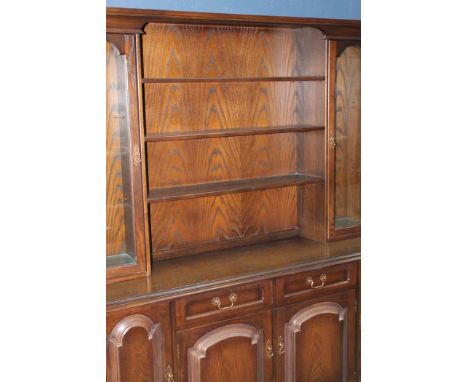 DINING ROOM SUITE
including dining table, six chairs and a display cabinet on cupboard base