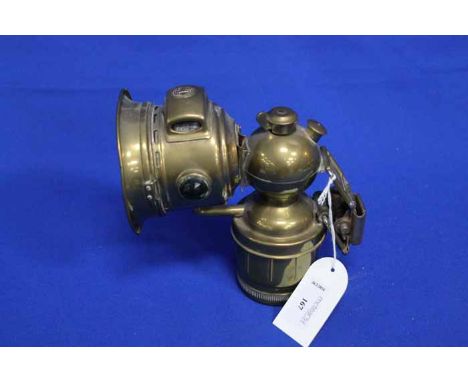 VICTORIAN CARBINE CYCLE LAMP 
and a miners' safety lamp (2)