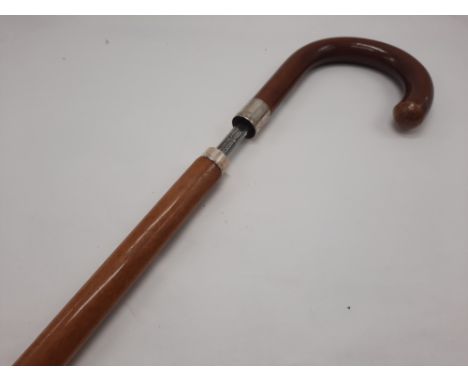 SWAINE BRIGG / WILKINSON SWORD STICK WITH ETCHED BLADE & HM SILVER COLLAR The blade length measures 67 cms from the handle to