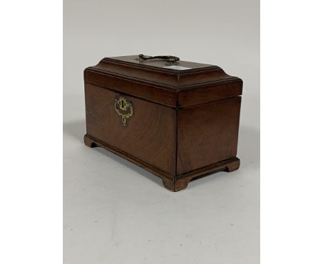 A George III mahogany tea caddy, original brass swing handle and escutcheon, caddy top opening to two division interior, brac