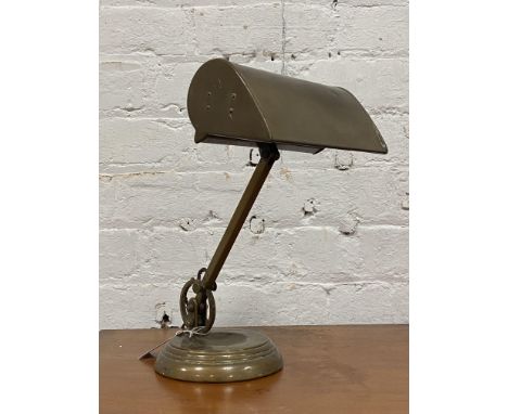 An Edwardian brass articulated desk lamp, stamped Made in England H30cm