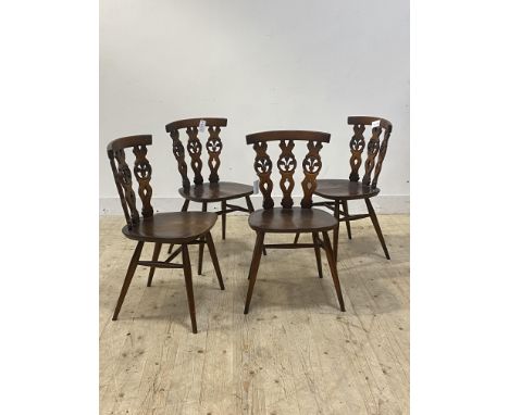 Ercol, a set of four stained elm and beech dining chairs, H79cm