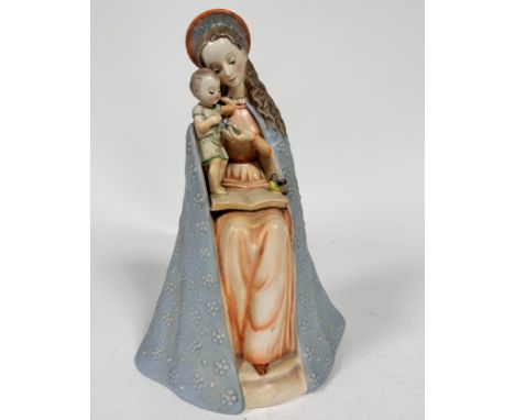 A Hummel pottery figure of a Madonna and Infant Jesus, decorated with polychrome enamels, (h 23cm x 16cm x 11cm)