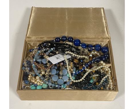 A large collection of paste pearl necklaces, white metal bead necklaces, turquoise style bead necklace, a silver carnelian mo