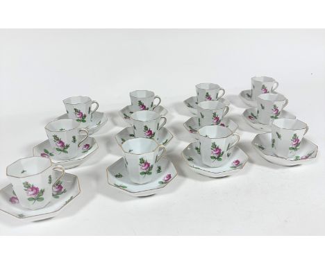 A set of twelve Hungarian Herend porcelain octagonal tapered chocolate cups with S scroll handle to side, saucers, all decora