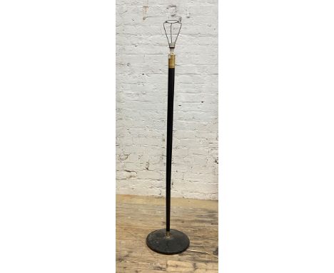 A mid century ebonised and brass mounted standard lamp, H157cm