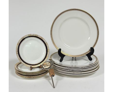 A set of five Aynsley side plates decorated with gold gilding and blue enamel and a set of eight Maddock dinner plate decorat