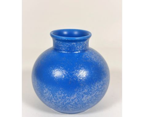 An unusual Poole pottery turquoise glazed squat vase with overlaid silver patination, signed Poole England, shows no signs of