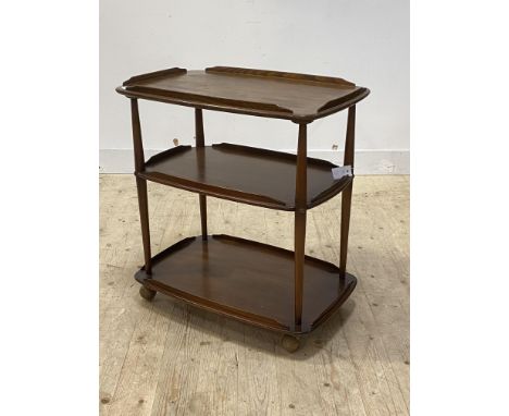 Ercol, a three tier drinks trolley, in mid fume, H77cm, W72cm, D42cm