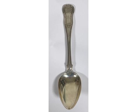 An Irish Dublin 1818 silver Fiddle, Shell and Thread pattern table spoon with engraved griffin cipher, stamped LAW verso, mak