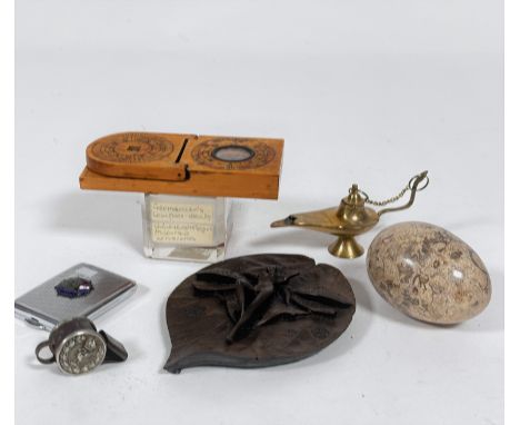 A marble egg (d.8cm), a miniature Chinese reproduction compass, used by Chinese astrologer in casting horoscopes, mounted on 