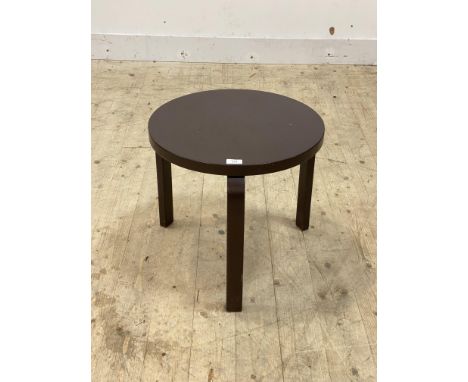 A Vintage lamp table in the style of Alver Aalto, the circular top over three bentwood supports, finished in brown lacquer pa