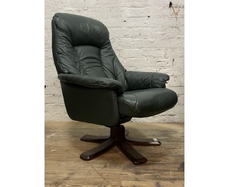 A Vintage green leather upholstered reclining easy chair H102cm