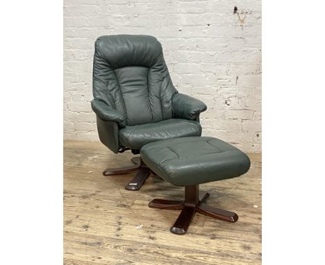 A Vintage green leather upholstered reclining easy chair and footstool H102cm