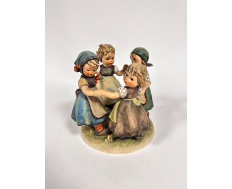 A Hummel pottery figure group Ring of Roses, (18cm x 16cm)
