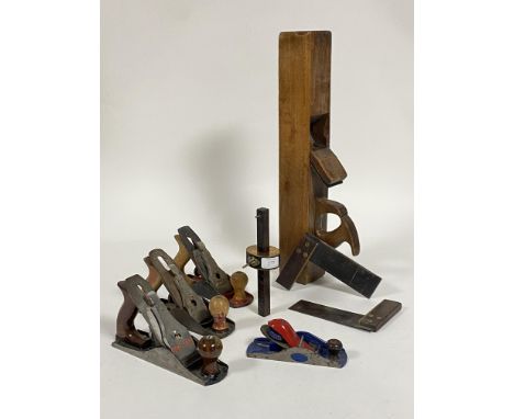 Vintage tools, an ebony and brass mounted joiners scribe, two rosewood and brass mounted squares, three No. 4 planes and a No