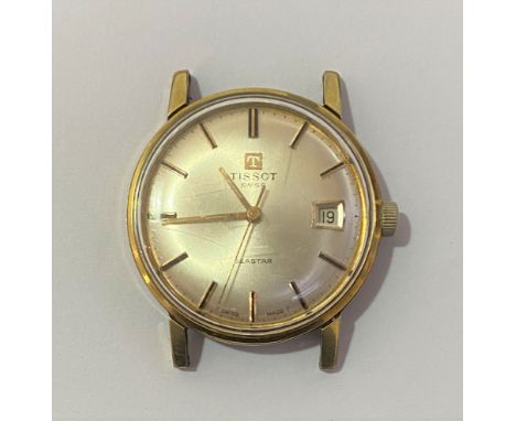 A Gents Tissot seastar yellow metal manual wind wristwatch, the silvered dial with applied baton markers and date aperture, n