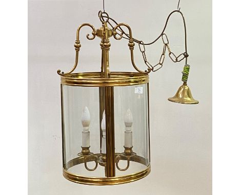 A lacquered brass and glass hall lantern of cylindrical outline, late 20th century, with four branches, suspended from ceilin