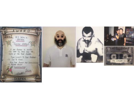 CHARLES BRONSON ARTWORK/PHOTOS/CASSETTE. Six items to include a 'No1. Wife In Britain' award drawn on A4 paper by Charles Bro