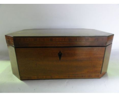 A 19th century sewing box of rectangular form with cross banded borders lined by further ebony and light timber string inlay,