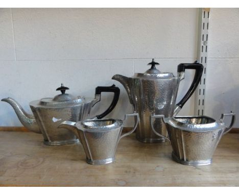 A four piece Don Dewter silver plated tea set comprising teapot, sugar basin and milk jug, all with hammered finish