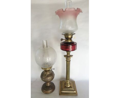 A good quality brass oil lamp, the stem and base in the form of a fluted column raised on a squared plinth supporting a Corin