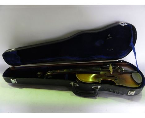 A vintage student's violin set within a blue felt lined case together with associated bow