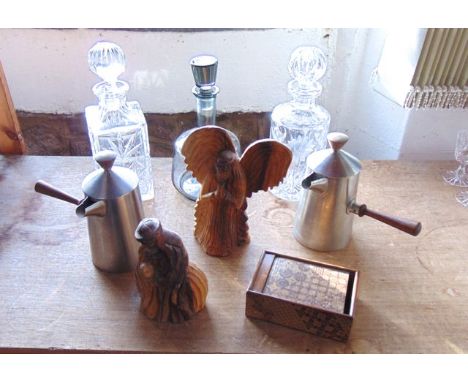 A smoked glass decanter in the Holmegaard manner together with a clear cut glass decanter of squared form, a further cylindri