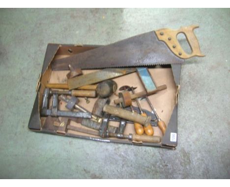 A small collection of vintage woodworking tools including gadgets, G clamps, scrapers, saws, etc