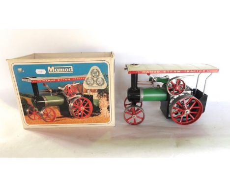 A boxed Mamod steam tractor engine