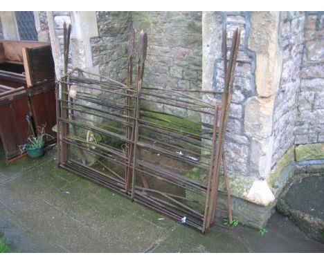 Six reclaimed wrought iron estate fencing panels with horizontal turned rails (AF), (each panel six feet wide approx)