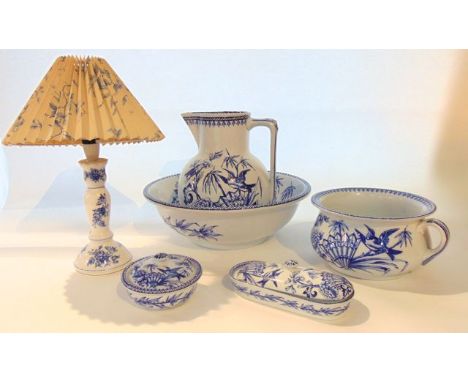 A collection of 19th century toilet wares with blue and white printed bird, fan and bamboo decoration in the Japanese manner 