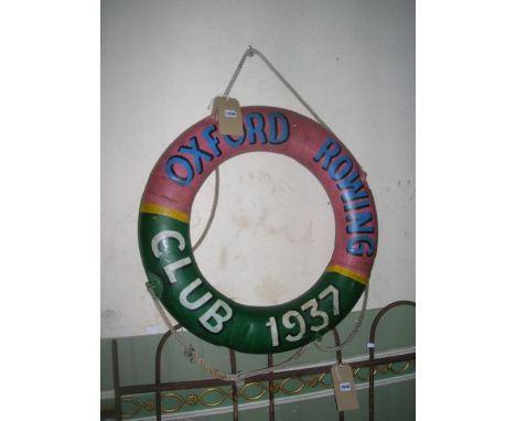 A vintage style life ring with decorative painted finish and lettering Oxford Rowing Club and dated 1937