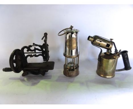 A brass and chromium miner's lamp bearing brass plaque  reading Protecta Lamp and Lighting Type 6 M & Q Safety Lamps, Approva