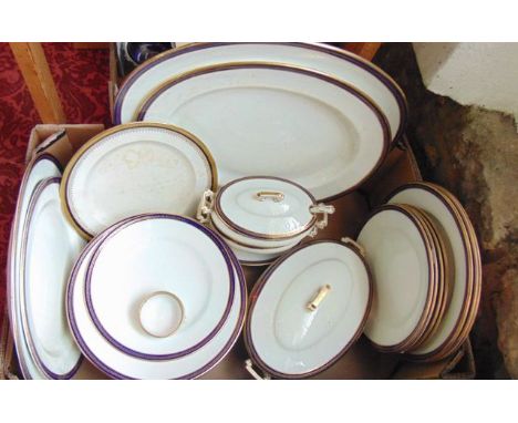 A collection of Copeland Spode dinner wares with blue and gilt border decoration comprising four oval graduated meat plates, 