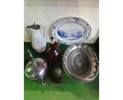 A silver plated dish of oval form raised on a pedestal base by Kemp Brothers, Union Street, Bristol together with a silver pl