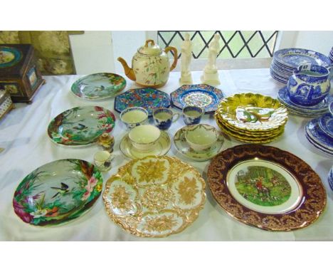 A 19th century Meissen cabinet plate with relief moulded and gilded fruit and scrolling decoration on a white ground, with un