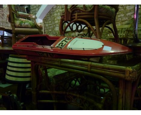 A vintage glass fibre hull speed boat