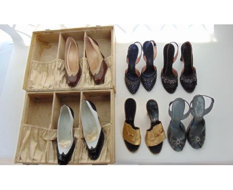 A vintage stitched velum shoe case with divisional lined interior containing two pairs of Kurt Geiger high heeled shoes, toge