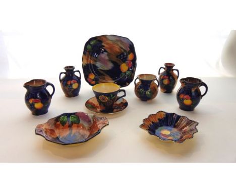 A collection of H & K Tunstall Autumn pattern wares comprising a pair of two handled vases, a further two handled vase, a pai