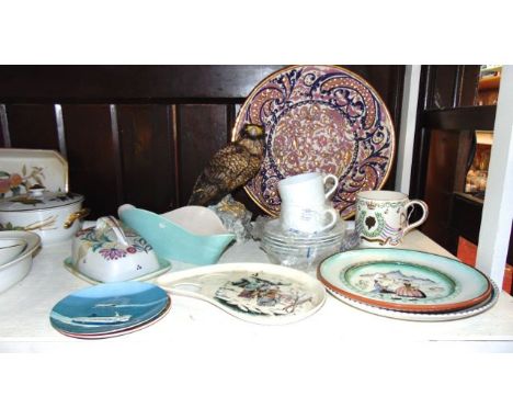 A ceramic model of a bird of prey, a large Spanish charger with pink, blue and lustred decoration,  a Poole Pottery cheese di