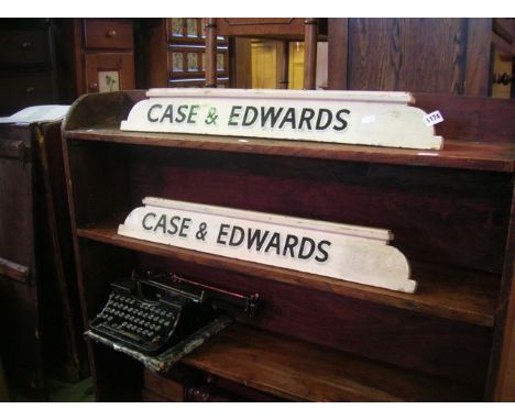 A pair of vintage painted wooden haberdashers display signs with painted lettering Case & Edwards
