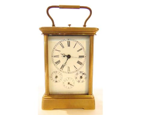 A brass carriage clock,  the enamel dial with subsidiary calendar, alarm and day dials with eight day striking movement, 19 c