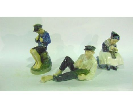 A collection of three Royal Copenhagen figures including a seated young girl mending a sock (?), with painted mark to base 13