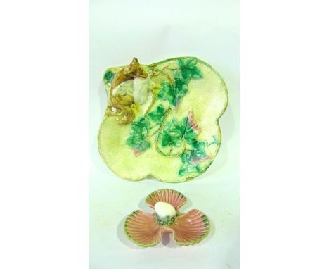 A 19th century majolica serving plate of trefoil shape form with moulded and painted figure of a fox carrying off a goose, wi