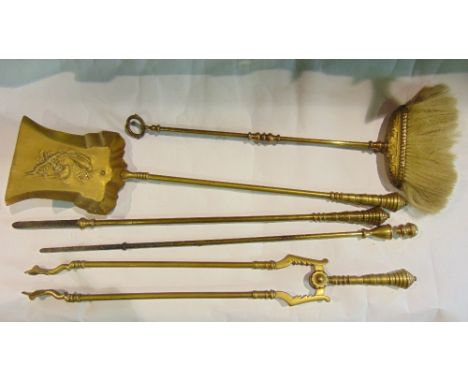 Brass fireside effects comprising a trowel, two pokers, a brush and tongs