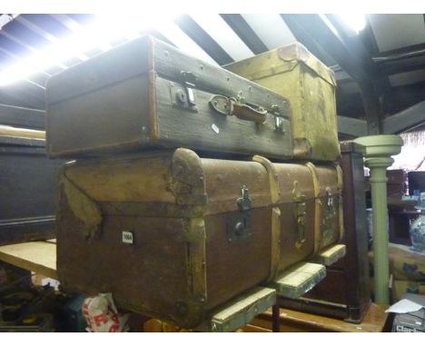 A vintage fibre and timber lathe bound cabin trunk, a further fibre trunk possibly for hats with leather handle to lid and re