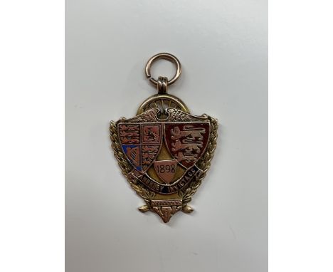 9CT ROSE GOLD AND ENAMEL PRESENTATION MEDALLION 1898 WITH INSCRIPTION TO REVERSE, 14.9 GRAMS