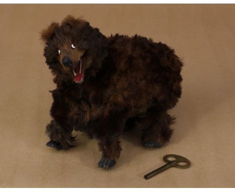 A late 19th century/early 20th century novelty clockwork automaton toy, in the form of a Bear, attributed to Roullet &amp; De